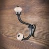 Riidenagi, malm, L110mm, värvus metall, keraamilised nupud