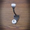Riidenagi, malm, L110mm, värvus metall, keraamilised nupud - Image 4